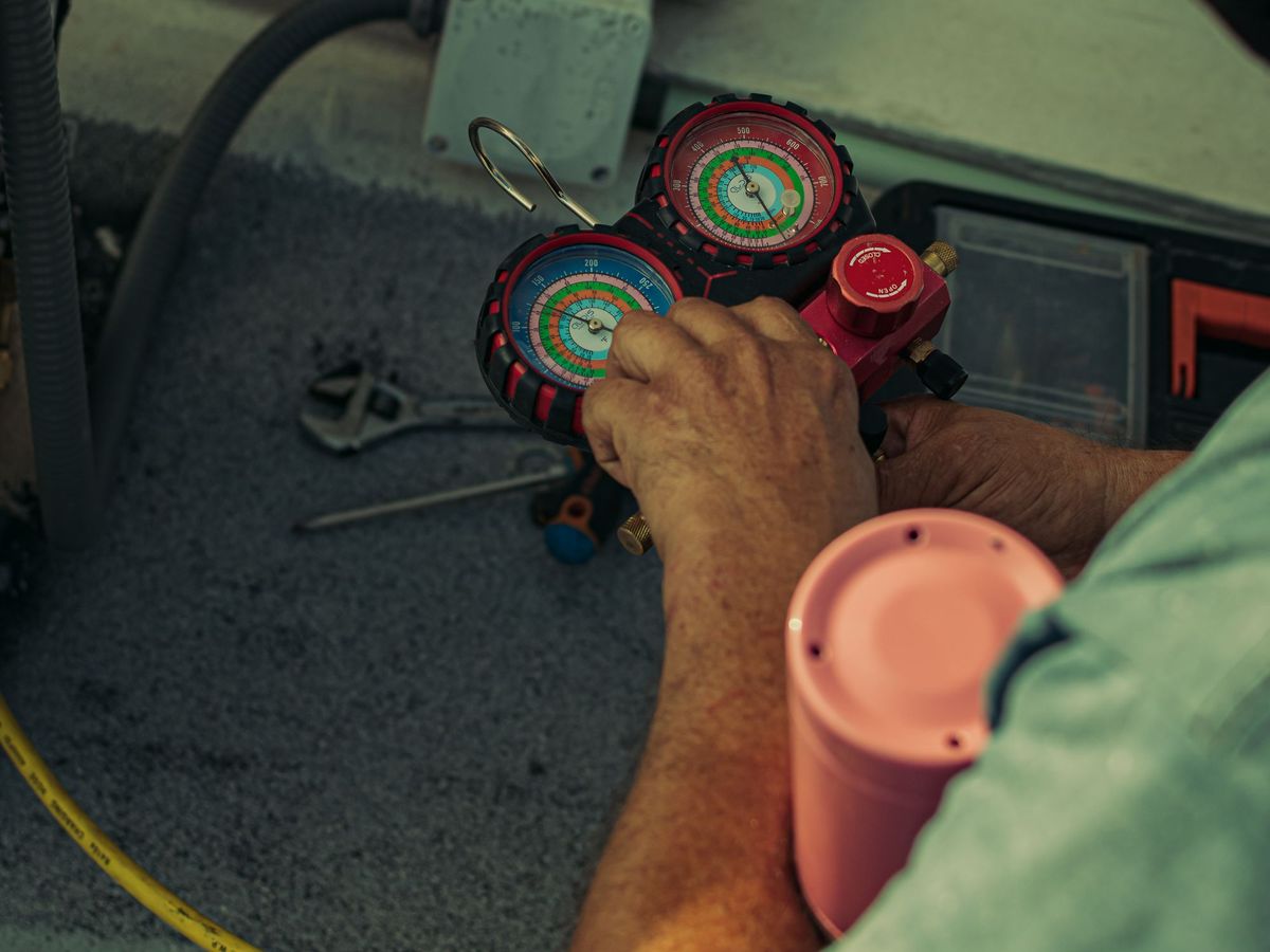 Refrigerant gauges hooked to an air conditioner during an HVAC diagnostic, North Little Rock AR heating and air