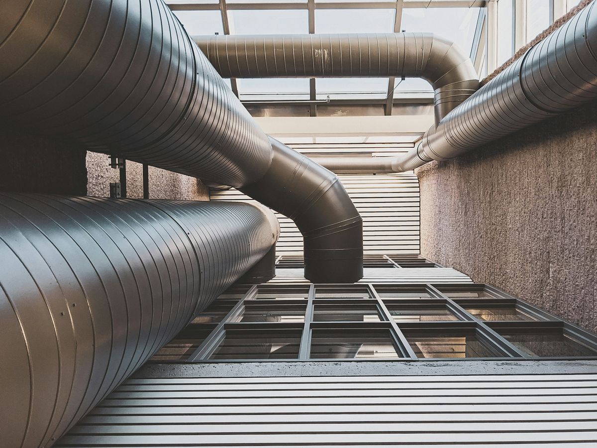 Large spiral ductwork running through an industrial building, industrial HVAC in Central Arkansas